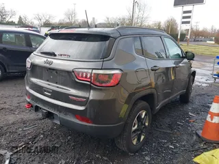 2017 Jeep Compass Trailhawk with VIN 3C4NJDDB9HT657173, listed as a IAAI auction lot 41613348 with 60,781 mi miles and . Bid and sale history available at DreamBid. Image 4.