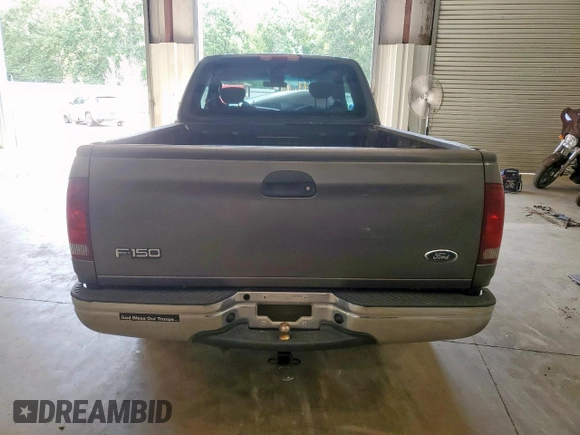 2002 Ford F-150 XL with VIN 1FTRX17212NB63939, listed as a Copart auction lot 62728225 with Not provided miles and Salvage title. Bid and sale history available at DreamBid. Image 6.