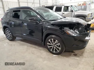 2025 Toyota Corolla Cross XLE с VIN 7MUDAABG0SV129473, выставлен на аукционе Copart как лот 52021975 с пробегом 9 748 миль миль и Списание • Salvage title. История ставок и продаж доступна на DreamBid. Изображение 4.