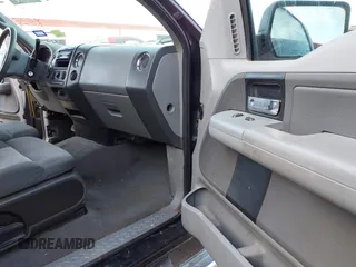 2007 Ford F-150 STX with VIN 1FTRX02WX7KA55431, listed as a IAAI auction lot 41693108 with 451,994 mi miles. Bid and sale history available at carsss.com. Image 5.