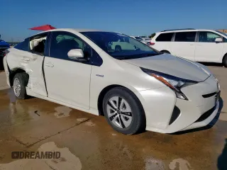2017 Toyota Prius Two z VIN JTDKARFUXH3038947, wystawiony jako Copart lot #56379015 z przebiegiem 64 230 mil mil oraz Szkoda całkowita • Salvage title. Historia ofert i sprzedaży dostępna na DreamBid. Obrazek 4.