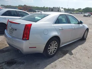 2010 Cadillac CTS with VIN 1G6DA5EG9A0128758, listed as a IAAI auction lot 41958677 with 156,088 mi miles and . Bid and sale history available at DreamBid. Image 4.