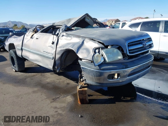 2001 Toyota Tundra SR5 with VIN 5TBRT34161S220253, listed as a IAAI auction lot 41598840 with 242,488 mi miles and . Bid and sale history available at carsss.com. Image 1.