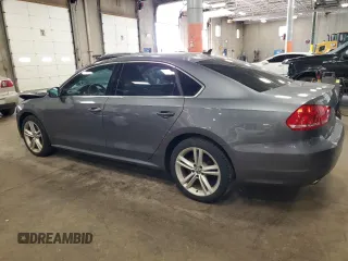 2015 Volkswagen Passat SE with VIN 1VWBV7A36FC090786, listed as a Copart auction lot 61056925 with 120,331 mi miles and Salvage title. Bid and sale history available at DreamBid. Image 2.