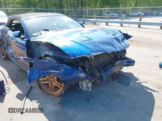2022 Ford Mustang EcoBoost z VIN 1FATP8UH4N5102828, wystawiony jako IAAI lot #42073571 z przebiegiem 69 931 mil mil oraz . Historia ofert i sprzedaży dostępna na DreamBid. Obrazek 6.