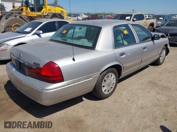 2005 Mercury Grand Marquis GS with VIN 2MEFM74W05X653375, listed as a IAAI auction lot 41995502 with 200,083 mi miles and . Bid and sale history available at DreamBid. Image 4.
