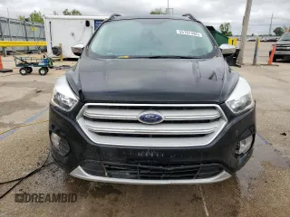 2018 Ford Escape SE z VIN 1FMCU9GD4JUA95666, wystawiony jako Copart lot #55767485 z przebiegiem 60 743 mil mil oraz Nie do naprawy • Non repairable. Historia ofert i sprzedaży dostępna na DreamBid. Obrazek 5.