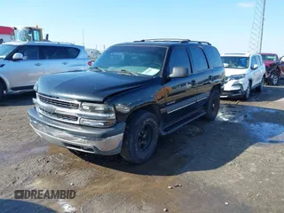 2002 Chevrolet Tahoe LT z VIN 1GNEC13Z02R203361, wystawiony jako IAAI lot #41580885 z przebiegiem 349 050 mil mil oraz . Historia ofert i sprzedaży dostępna na DreamBid. Obrazek 17.
