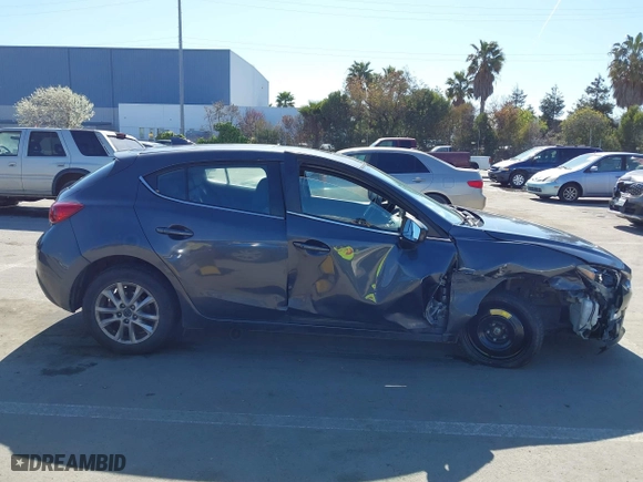 2016 Mazda Mazda3 i Grand Touring with VIN JM1BM1N74G1333699, listed as a IAAI auction lot 41836178 with 194,946 mi miles. Bid and sale history available at carsss.com. Image 13.