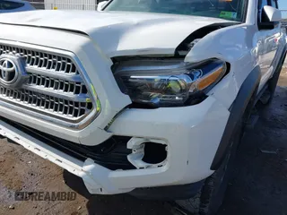 2017 Toyota Tacoma SR5 with VIN 3TMCZ5AN8HM063513, listed as a IAAI auction lot 40703177 with 42,323 mi miles and . Bid and sale history available at carsss.com. Image 19.