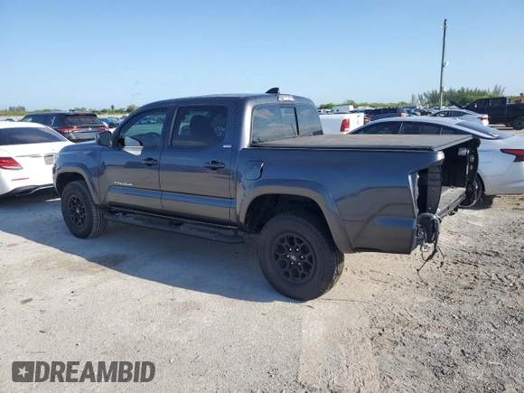 2020 Toyota Tacoma SR5 with VIN 3TMAZ5CN9LM125157, listed as a Copart auction lot 57178885 with 59,830 mi miles and Salvage title. Bid and sale history available at DreamBid. Image 2.