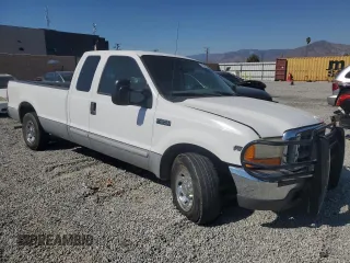 2001 Ford Super Duty F-250 XL with VIN 1FTNX20L01EA40364, listed as a Copart auction lot 74756234 with 244,584 mi miles and Salvage Title. Bid and sale history available at carsss.com. Image 4.