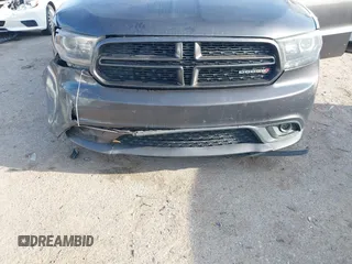 2015 Dodge Durango R/T with VIN 1C4SDHCT8FC833943, listed as a IAAI auction lot 41898447 with 209,999 mi miles and . Bid and sale history available at DreamBid. Image 6.