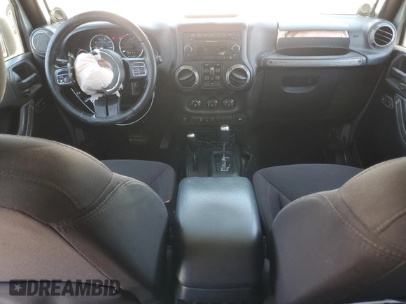 2014 Jeep Wrangler Unlimited Sport with VIN 1C4HJWDG1EL221302, listed as a Copart auction lot 63331015 with 213,912 mi miles and Salvage title. Bid and sale history available at DreamBid. Image 8.