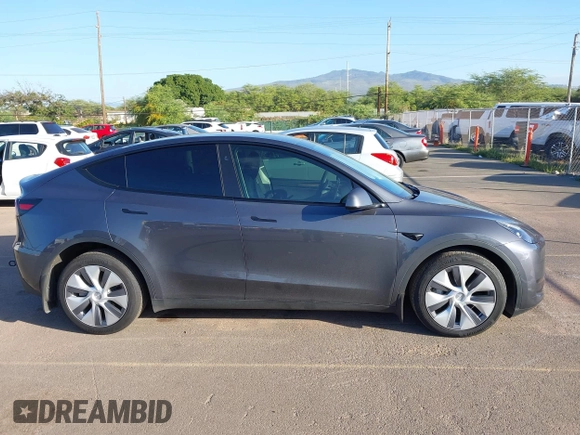 2023 Tesla Model Y Long Range with VIN 7SAYGDEE0PF928836, listed as a IAAI auction lot 41538742 with 9,630 mi miles and . Bid and sale history available at DreamBid. Image 13.