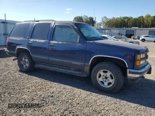 1999 GMC Yukon with VIN 1GKEK13R3XJ757466, listed as a Copart auction lot 75750884 with 270,768 mi miles and Salvage Title. Bid and sale history available at carsss.com. Image 4.