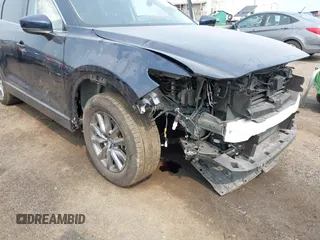 2023 Mazda CX-9 Touring with VIN JM3TCBCY6P0642838, listed as a IAAI auction lot 42407123 with 15,181 mi miles and . Bid and sale history available at DreamBid. Image 6.