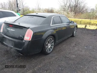 2013 Chrysler 300 with VIN 2C3CCABG1DH707991, listed as a IAAI auction lot 41983356 with 162,846 mi miles. Bid and sale history available at carsss.com. Image 4.