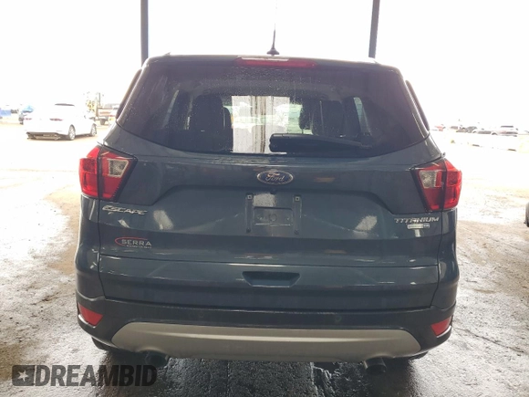 2019 Ford Escape Titanium with VIN 1FMCU9J98KUB77258, listed as a Copart auction lot 51213435 with 92,708 mi miles and Clean Title. Bid and sale history available at carsss.com. Image 6.