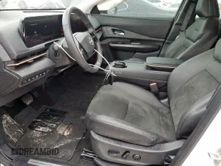 2024 Nissan ARIYA Evolve+ with VIN JN1DF0BB1RM738901, listed as a Copart auction lot 55597295 with 6,569 mi miles and Salvage title. Bid and sale history available at DreamBid. Image 7.