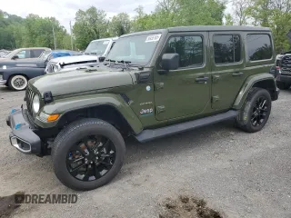 2023 Jeep Wrangler Sahara z VIN 1C4JJXP62PW553101, wystawiony jako Copart lot #56935165 z przebiegiem 28 157 mil mil oraz Szkoda całkowita • Salvage title. Historia ofert i sprzedaży dostępna na DreamBid. Obrazek 1.
