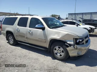 2010 Chevrolet Suburban LT with VIN 1GNUCJE09AR204548, listed as a Copart auction lot 52186805 with 168,015 mi miles and Salvage Title. Bid and sale history available at DreamBid. Image 4.