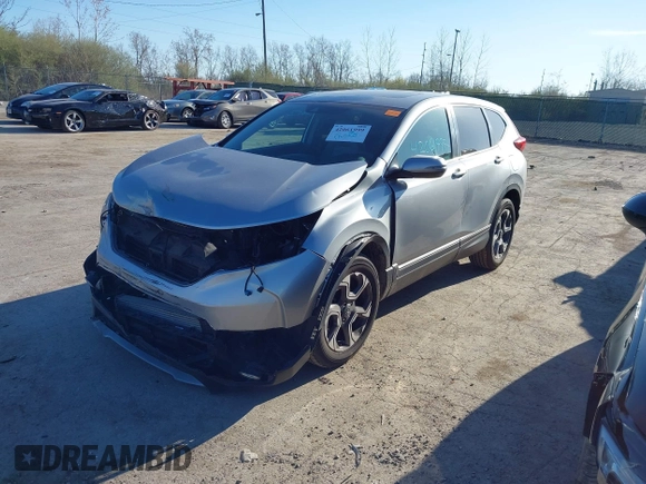 2018 Honda CR-V EX with VIN 7FARW2H56JE097214, listed as a IAAI auction lot 42061999 with 74,862 mi miles and . Bid and sale history available at DreamBid. Image 18.