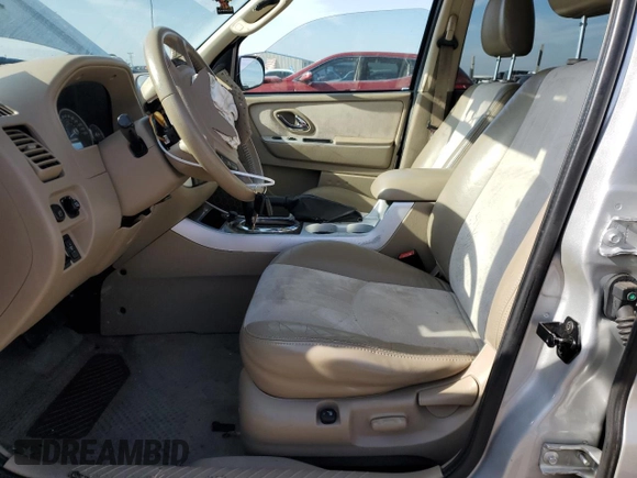 2005 Mercury Mariner Luxury z VIN 4M2YU56195DJ03528, wystawiony jako Copart lot #83315034 z przebiegiem 118 696 mil mil oraz Szkoda całkowita • Salvage title. Historia ofert i sprzedaży dostępna na DreamBid. Obrazek 7.