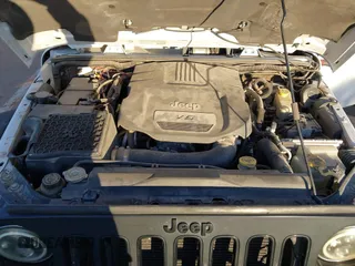 2014 Jeep Wrangler Unlimited Sahara with VIN 1C4BJWEG0EL273475, listed as a IAAI auction lot 41515425 with 128,900 mi miles. Bid and sale history available at carsss.com. Image 10.
