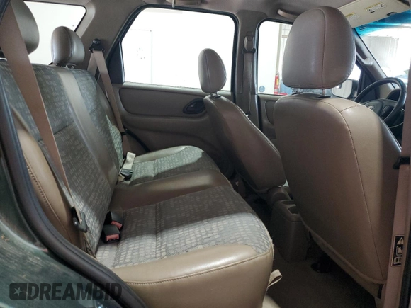 2002 Ford Escape XLS Value with VIN 1FMYU01B32KC48043, listed as a Copart auction lot 63011005 with 167,185 mi miles and Salvage title. Bid and sale history available at DreamBid. Image 11.