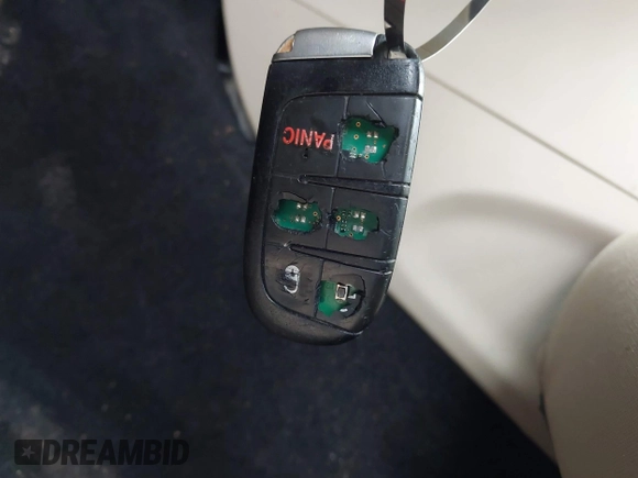 2014 Jeep Grand Cherokee Laredo with VIN 1C4RJEAG5EC424244, listed as a IAAI auction lot 41608821 with 156,251 mi miles and . Bid and sale history available at DreamBid. Image 11.