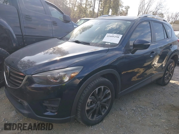 2016 Mazda CX-5 Grand Touring with VIN JM3KE2DY1G0708572, listed as a IAAI auction lot 41685298 with 109,427 mi miles. Bid and sale history available at carsss.com. Image 17.