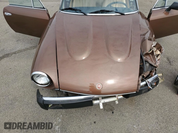 1980 FIAT 124 Spider z VIN 124CS20160764, wystawiony jako Copart lot #69708634 z przebiegiem 64 421 mil mil oraz Szkoda całkowita • Salvage title. Historia ofert i sprzedaży dostępna na DreamBid. Obrazek 12.