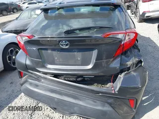 2021 Toyota C-HR LE with VIN NMTKHMBX3MR128835, listed as a IAAI auction lot 41891619 with 57,744 mi miles and . Bid and sale history available at DreamBid. Image 6.