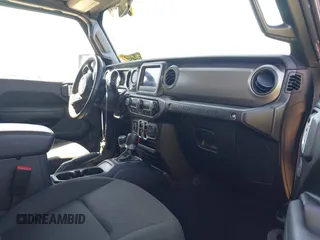 2022 Jeep Wrangler Unlimited Willys with VIN 1C4HJXDN1NW144112, listed as a IAAI auction lot 41867571 with 63,876 mi miles and . Bid and sale history available at DreamBid. Image 5.