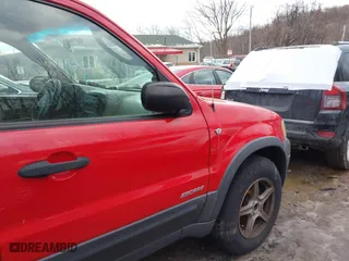 2002 Ford Escape Limited with VIN 1FMCU04132KB53687, listed as a IAAI auction lot 41468556 with 63,875 mi miles. Bid and sale history available at carsss.com. Image 14.