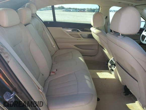 2018 BMW 7 Series 740i with VIN WBA7E2C55JG742497, listed as a Copart auction lot 82173994 with 52,354 mi miles and Salvage Title. Bid and sale history available at carsss.com. Image 10.