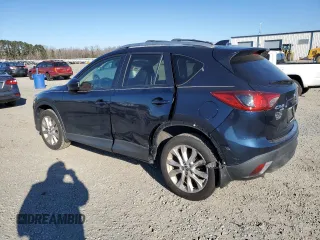 2014 Mazda CX-5 Grand Touring with VIN JM3KE4DY1E0405493, listed as a Copart auction lot 41688915 with 94,970 mi miles and Salvage Title. Bid and sale history available at carsss.com. Image 2.