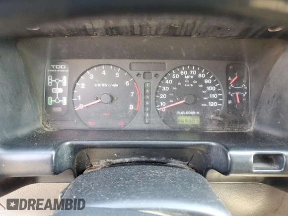 1999 Isuzu Trooper S with VIN JACDJ58X6X7924973, listed as a Copart auction lot 57881235 with 269,301 mi miles and Salvage title. Bid and sale history available at DreamBid. Image 9.