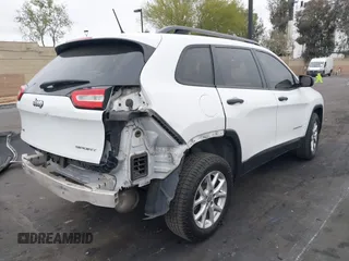 2015 Jeep Cherokee Sport z VIN 1C4PJMAB7FW635080, wystawiony jako IAAI lot #42062096 z przebiegiem 237 636 mil mil oraz . Historia ofert i sprzedaży dostępna na DreamBid. Obrazek 4.