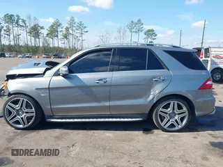 2013 Mercedes-Benz M ML 63 AMG with VIN 4JGDA7EB9DA155725, listed as a IAAI auction lot 41502675 with 64,849 mi miles. Bid and sale history available at carsss.com. Image 13.
