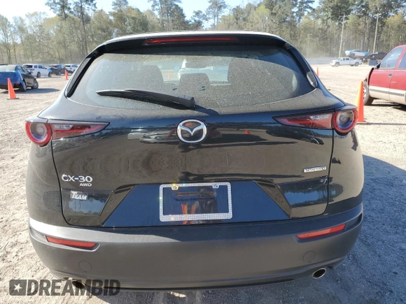 2024 Mazda CX-30 S with VIN 3MVDMBAM5RM688864, listed as a Copart auction lot 49920665 with 25,838 mi miles and Salvage Title. Bid and sale history available at DreamBid. Image 6.