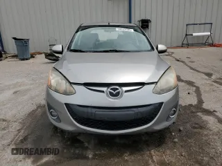 2013 Mazda 2 Touring z VIN JM1DE1LZ5D0162425, wystawiony jako Copart lot #59033595 z przebiegiem 225 932 mil mil oraz Szkoda całkowita • Salvage title. Historia ofert i sprzedaży dostępna na DreamBid. Obrazek 5.