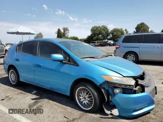 2010 Honda Insight LX with VIN JHMZE2H51AS028849, listed as a Copart auction lot 65547805 with 209,316 mi miles and Salvage title. Bid and sale history available at DreamBid. Image 4.