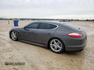 2013 Porsche Panamera S E-Hybrid z VIN WP0AD2A72DL045168, wystawiony jako Copart lot #59136215 z przebiegiem 139 576 mil mil oraz Czysty tytuł • Clean title. Historia ofert i sprzedaży dostępna na DreamBid. Obrazek 2.