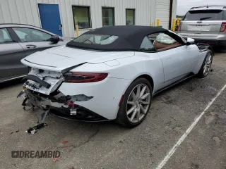 2020 Aston Martin DB11 z VIN SCFRMFCW3LGM08827, wystawiony jako Copart lot #84838664 z przebiegiem Nie podano mil oraz Szkody całkowita. Historia ofert i sprzedaży dostępna na DreamBid. Obrazek 3.