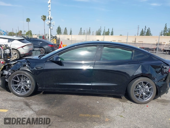 2022 Tesla Model 3 Long Range with VIN 5YJ3E1EB6NF233131, listed as a IAAI auction lot 41819409 with 38,308 mi miles and . Bid and sale history available at DreamBid. Image 13.