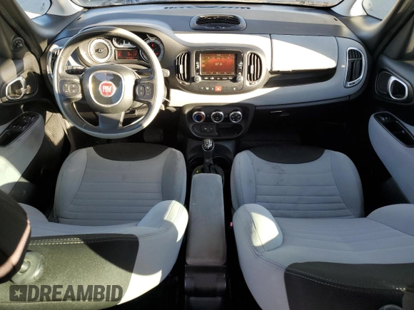 2014 FIAT 500L Easy with VIN ZFBCFABH1EZ023992, listed as a Copart auction lot 76139854 with 131,118 mi miles and Salvage Title. Bid and sale history available at carsss.com. Image 8.