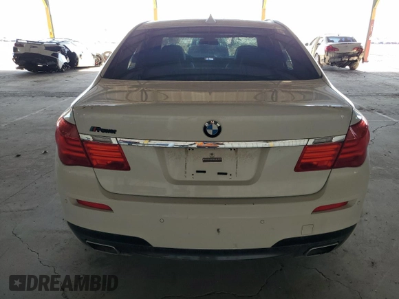 2012 BMW 7 Series 750Li с VIN WBAKB8C59CC852419, выставлен на аукционе Copart как лот 53736305 с пробегом 150 224 миль миль и Списание • Salvage title. История ставок и продаж доступна на DreamBid. Изображение 6.