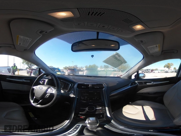 2016 Ford Fusion Titanium Hybrid with VIN 3FA6P0RU8GR127140, listed as a IAAI auction lot 41750405 with 110,861 mi miles. Bid and sale history available at carsss.com. Image 24.